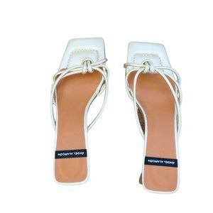 Strappy Heels by Angel Alacron